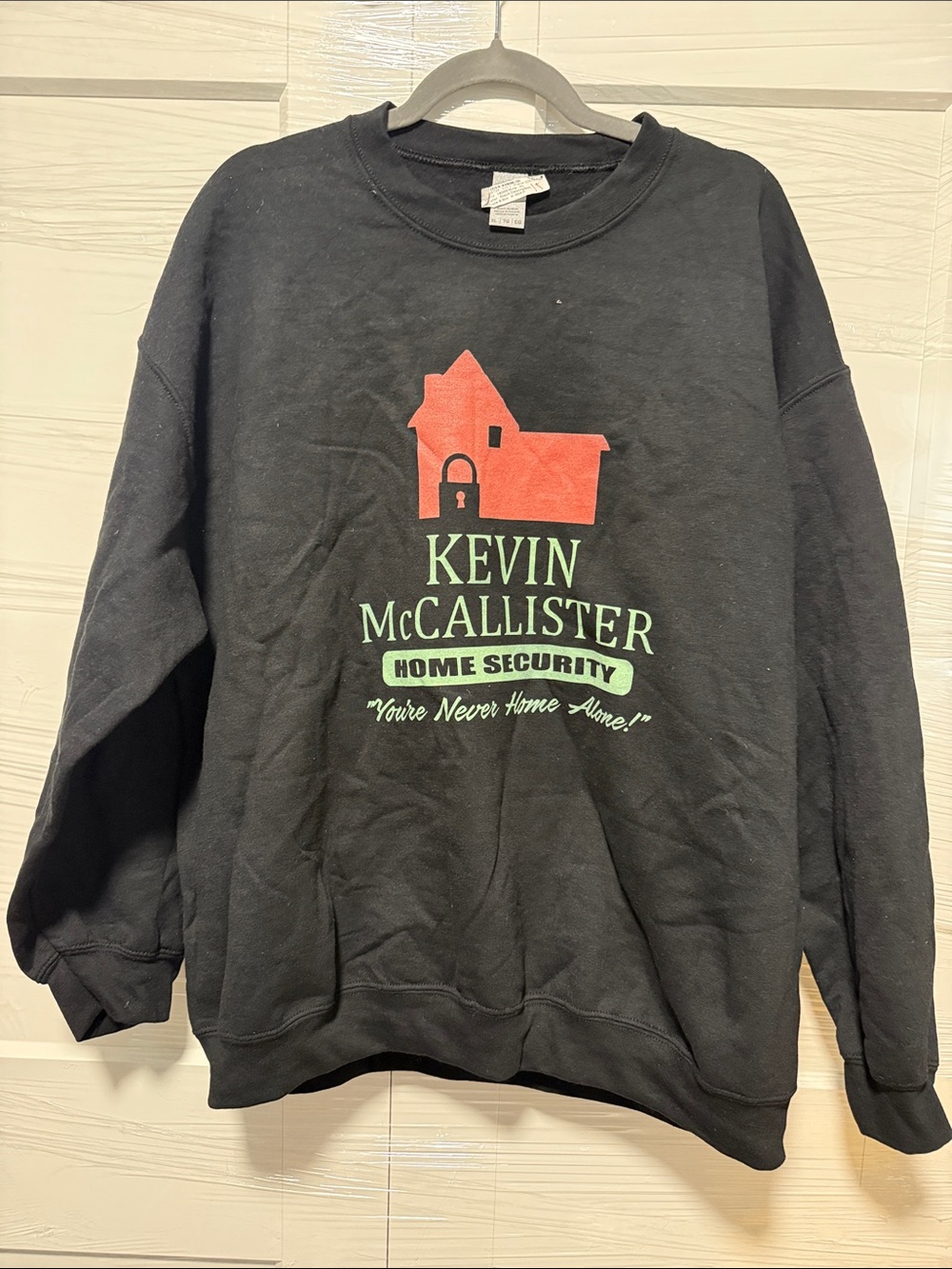 Gildan Black Crewneck Sweatshirt with Red House Graphic and Green Text
